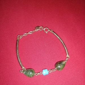 Gold bracelet with stone beads